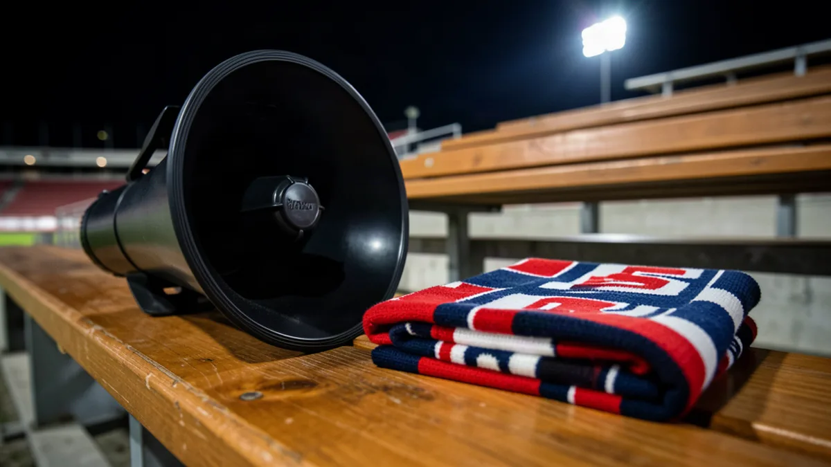 Mégaphone et écharpe de supporter en gros plan